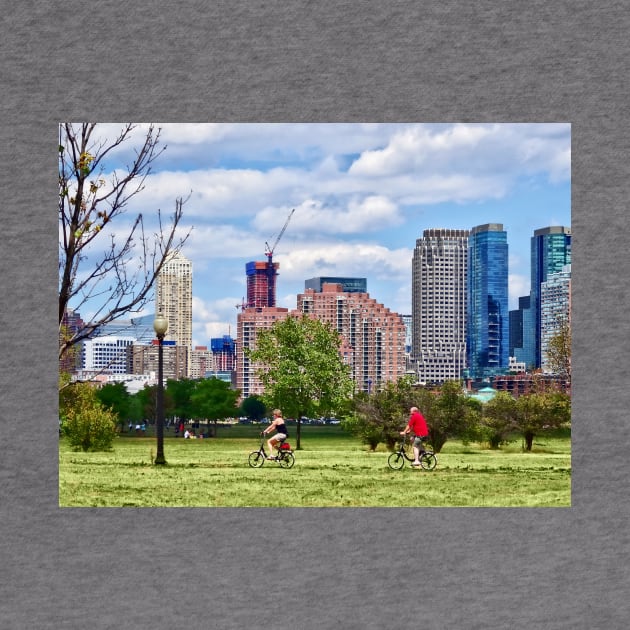 Jersey City NJ - Couple Cycling in Liberty State Park by SusanSavad